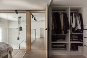 Open closet storage allows for plenty of space for belongings, but, should you choose, you can hide that dressing area.